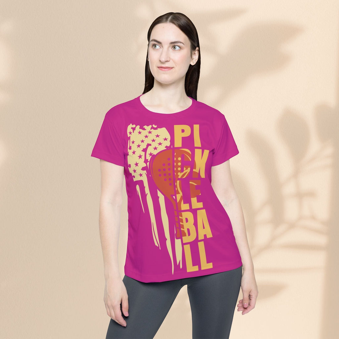 Sea Dragon Dreams women's pink sports jersey with a yellow pickleball paddle and star graphic, moisture-wicking fabric