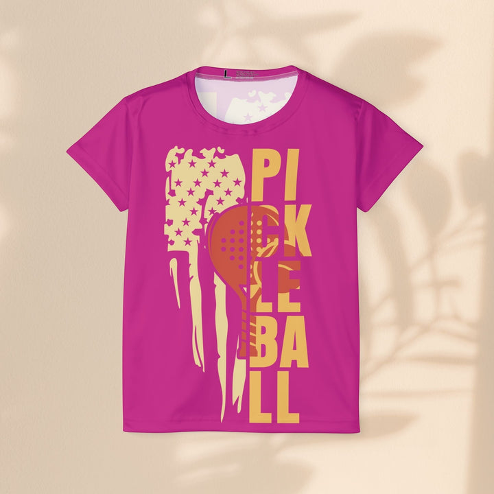 Sea Dragon Dreams women's pink moisture-wicking pickleball jersey with a distressed flag and paddle graphic design.