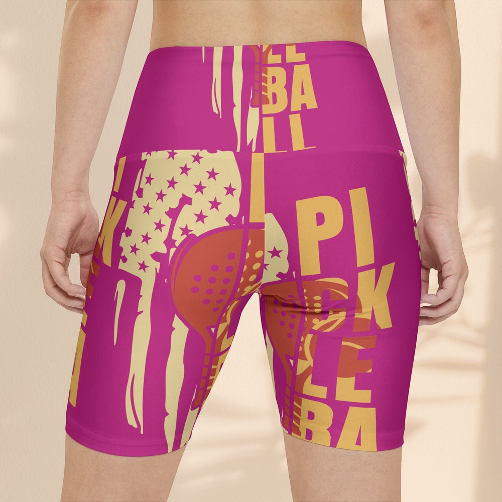 Sea Dragon Dreams pink pickleball workout shorts with yellow graphic print, featuring a high-waisted polyester fit.