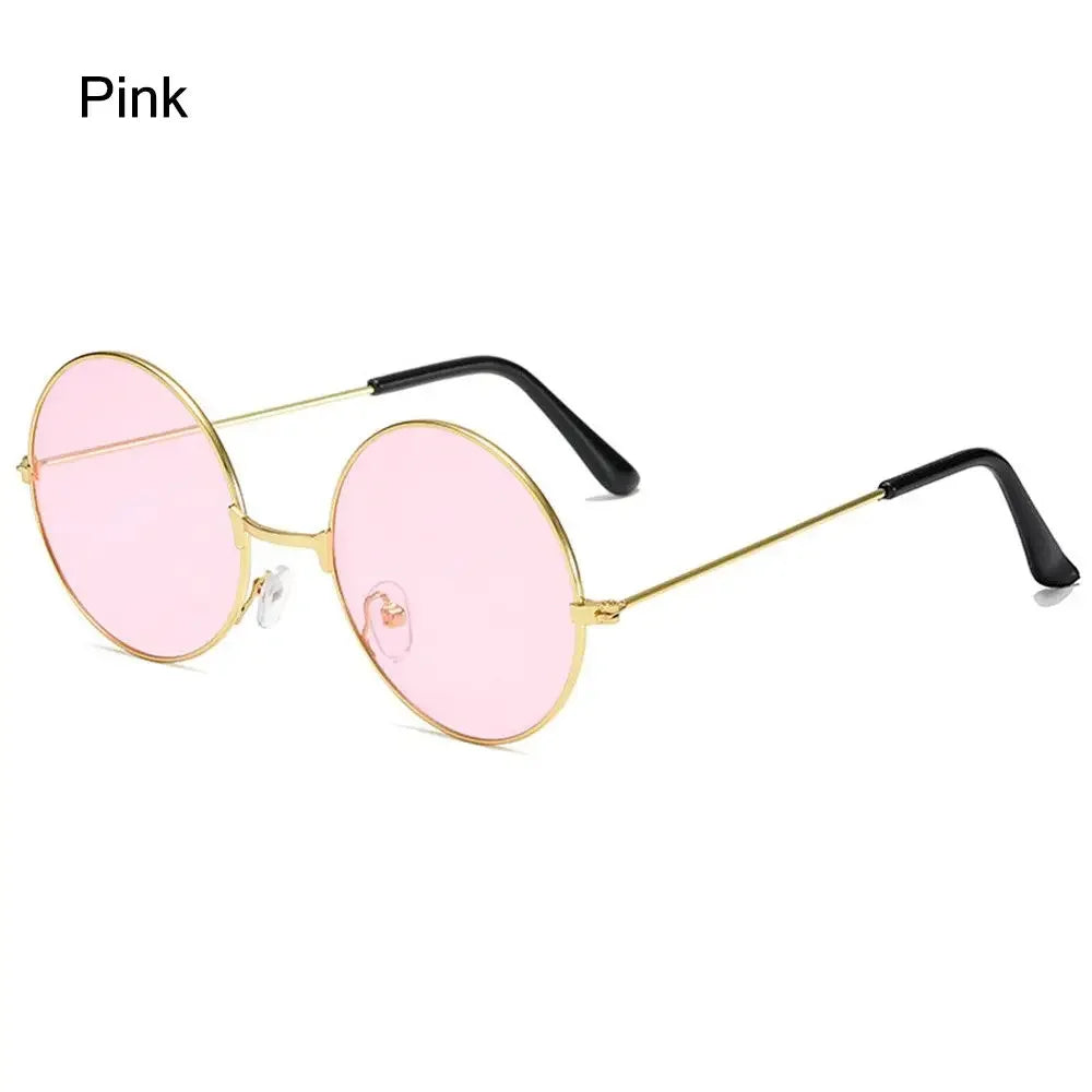 Sea Dragon Dreams round pink-tinted sunglasses with a thin gold metal frame and black temple tips