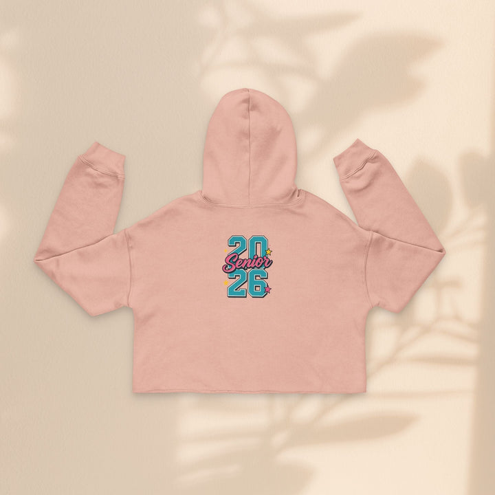 Sea Dragon Dreams pink cropped hoodie with Class of 2026 senior graphic on the back, featuring a raw hem and hood.