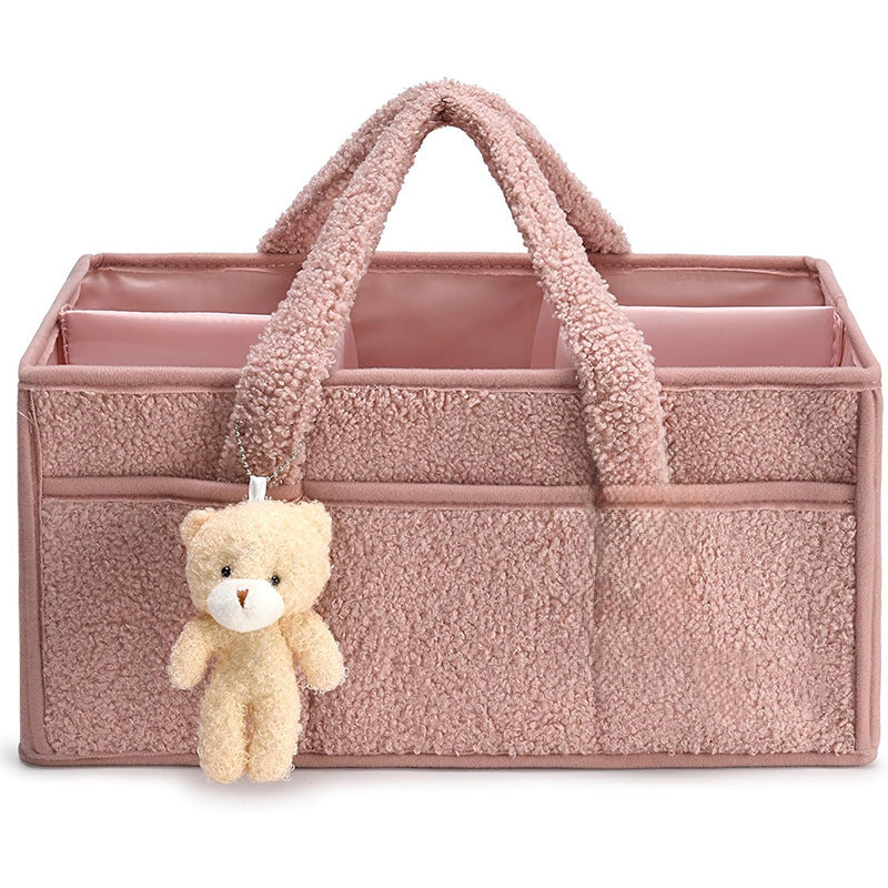 Sea Dragon Dreams pink plush sherpa diaper caddy with removable dividers and a cute teddy bear charm