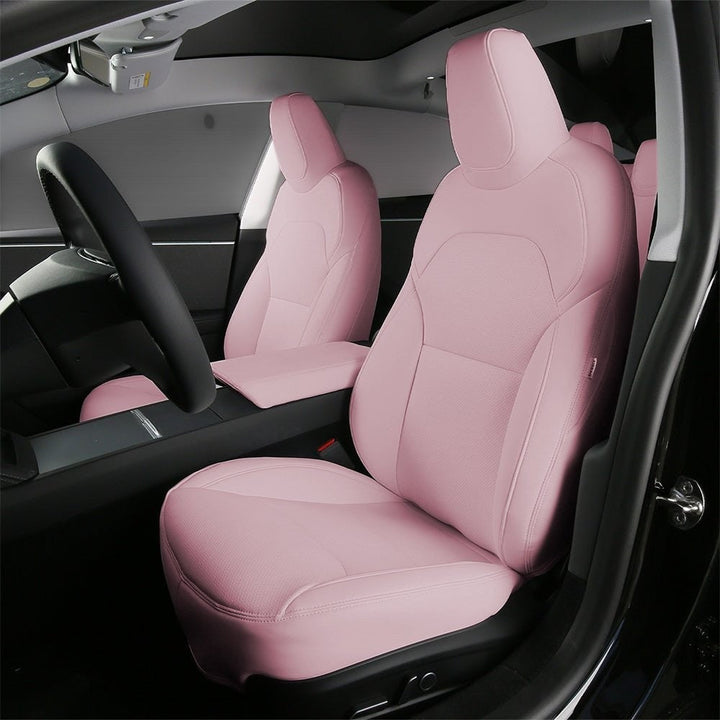 Sea Dragon Dreams pink leather seat covers installed in a Tesla Model 3 or Model Y interior for a custom look.