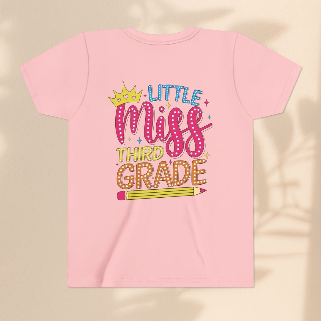 Sea Dragon Dreams pink youth t-shirt with Little Miss Third Grade graphic featuring a crown and pencil design.