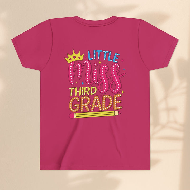 Sea Dragon Dreams youth t-shirt in dark pink featuring a Little Miss Third Grade graphic with a crown and pencil.