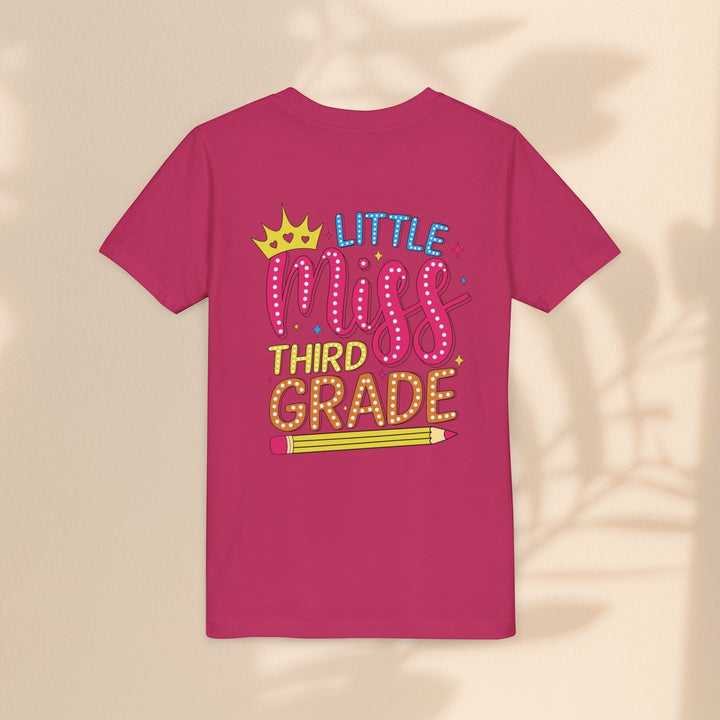 Sea Dragon Dreams youth tee in dark pink cotton with a Little Miss Third Grade graphic featuring a crown and pencil.