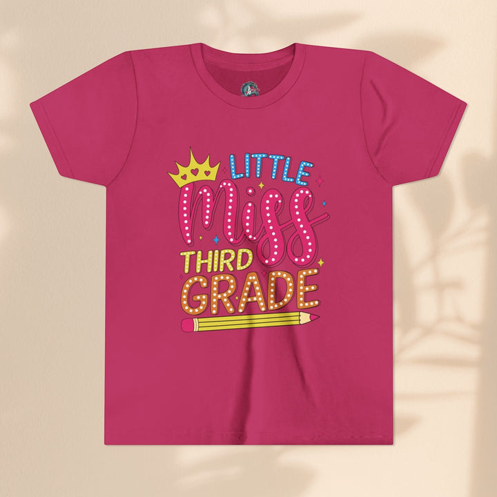 Sea Dragon Dreams pink youth t-shirt with Little Miss Third Grade graphic, crown, and pencil design.