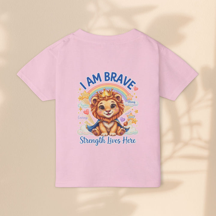 Sea Dragon Dreams toddler t-shirt in light pink cotton featuring a cute lion graphic with the text I Am Brave