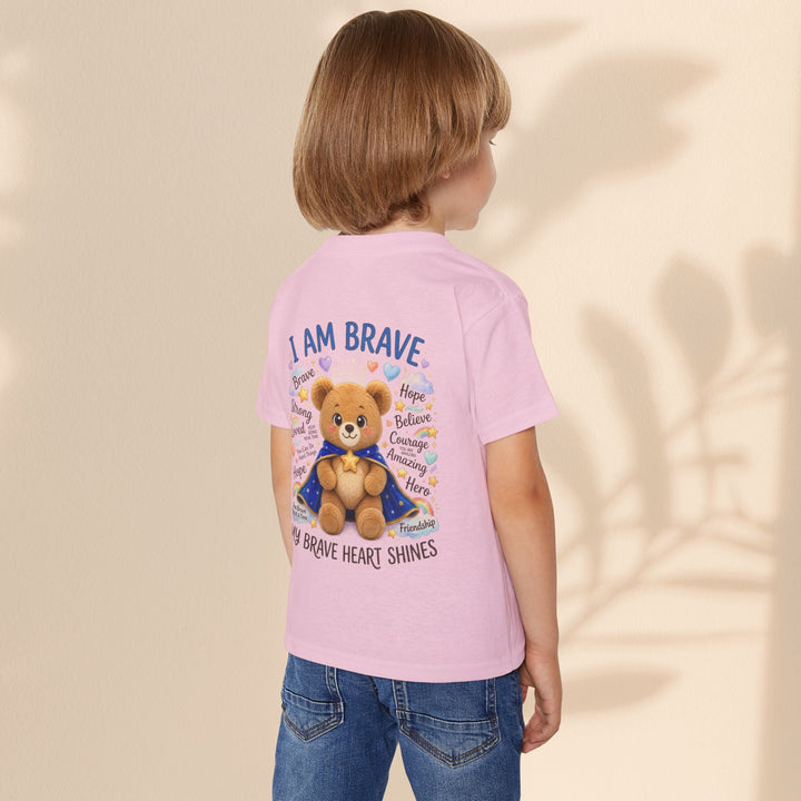 Sea Dragon Dreams toddler t-shirt in light pink cotton featuring a teddy bear graphic with the text I Am Brave