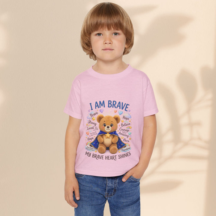 Sea Dragon Dreams toddler t-shirt in light pink cotton featuring a cute teddy bear graphic and I Am Brave text.