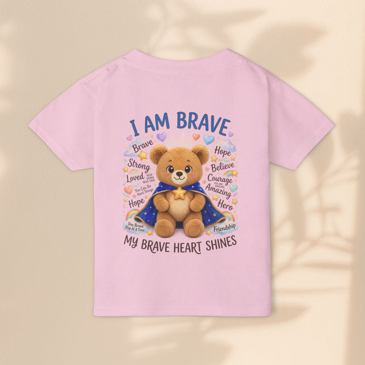 Sea Dragon Dreams toddler t-shirt in soft pink cotton featuring a cute teddy bear graphic with the text I Am Brave.