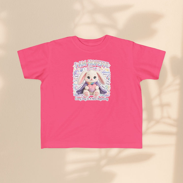 Sea Dragon Dreams pink toddler tee featuring a cute Hope Bunny graphic with the affirmation I Am Hopeful.