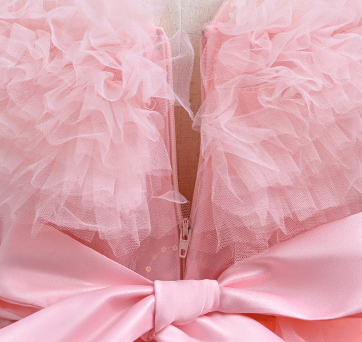 Sea Dragon Dreams light pink girls princess party dress featuring ruffled tulle bodice and satin bow detail