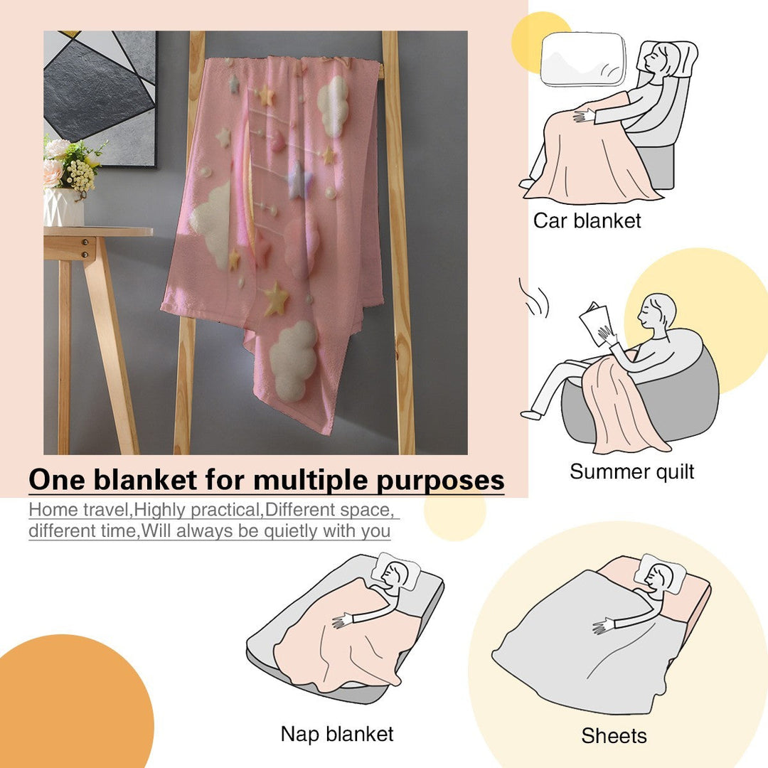 Sea Dragon Dreams pink unicorn milestone blanket shown as a versatile throw, nap blanket, and travel quilt for babies.
