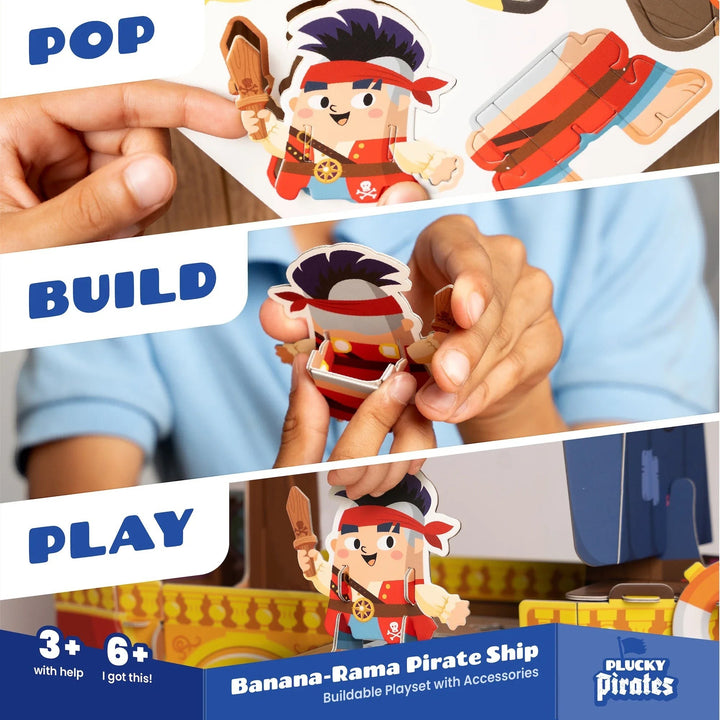 Sea Dragon Dreams Banana-Rama Pirate Ship buildable playset showing hands assembling colorful cardboard pirate figures