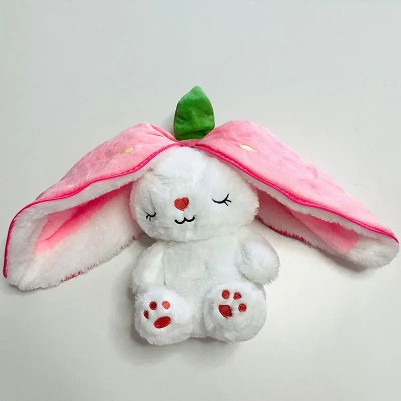 Sea Dragon Dreams white plush bunny with long pink strawberry-themed ears and a green leaf accent