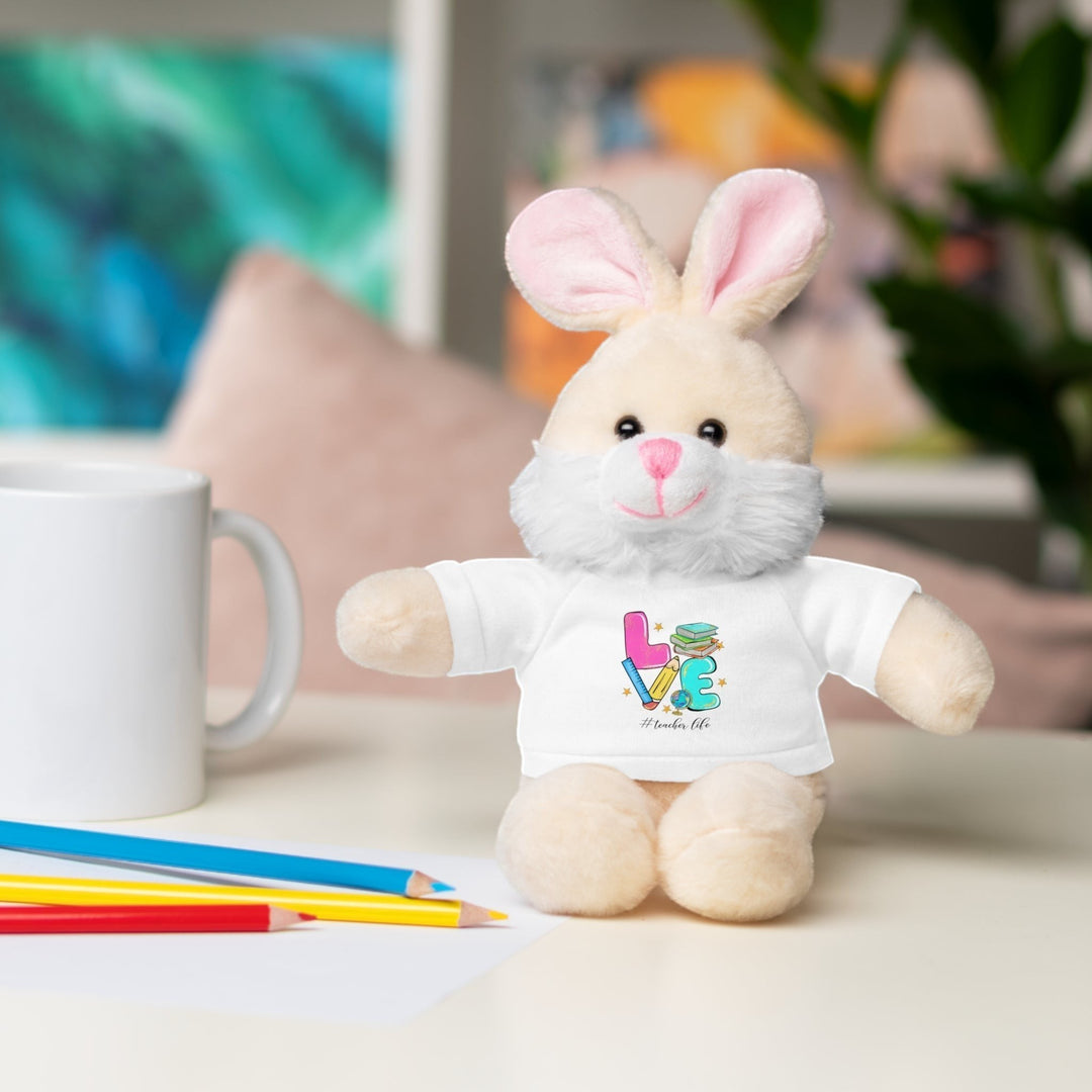 Sea Dragon Dreams plush bunny stuffed animal wearing a white cotton t-shirt with Love Teacher Life graphic design.