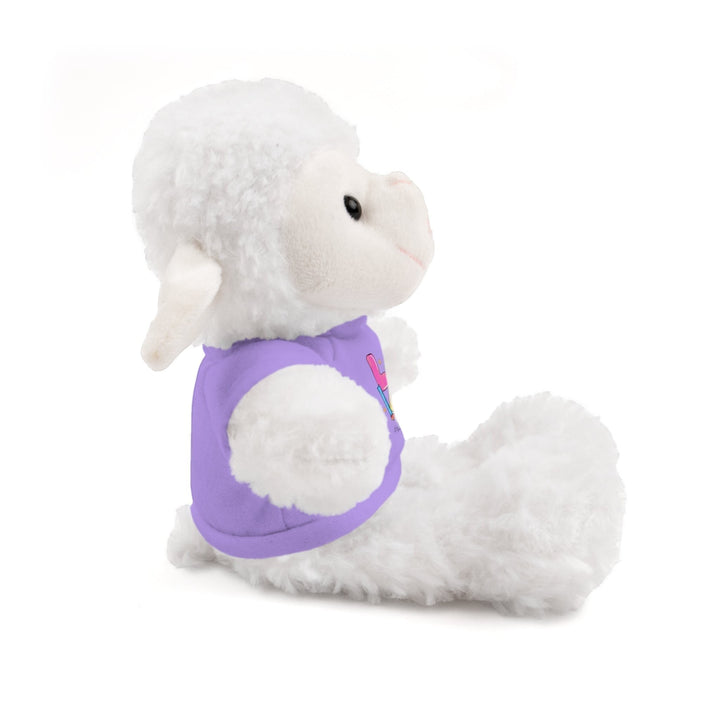 Sea Dragon Dreams white plush sheep stuffed animal wearing a purple cotton t-shirt with Love Teacher Life design