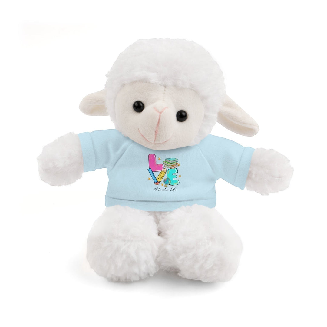 Sea Dragon Dreams plush white sheep stuffed animal wearing a light blue t-shirt with Love Teacher Life graphic print