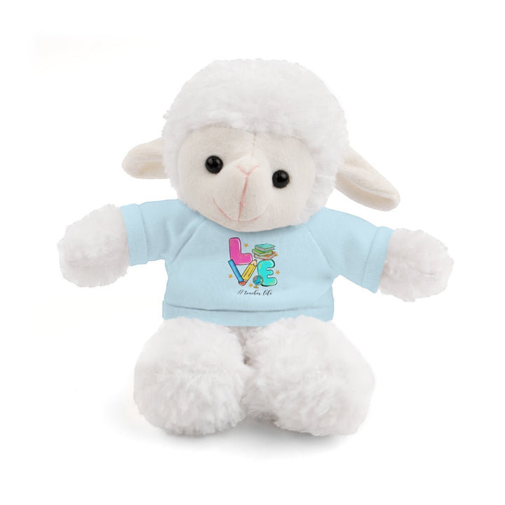 Sea Dragon Dreams plush white sheep stuffed animal wearing a light blue t-shirt with Love Teacher Life graphic print