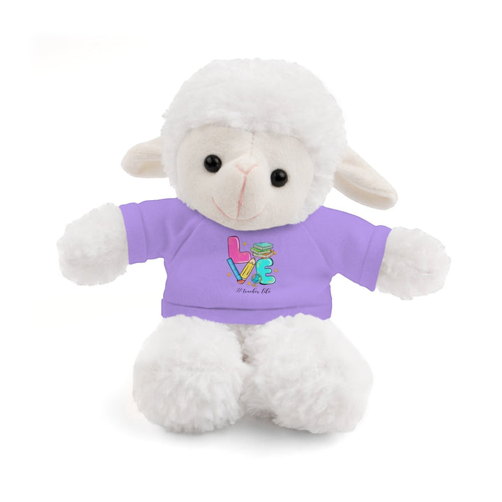 Sea Dragon Dreams plush white sheep toy wearing a purple cotton t-shirt with a Love Teacher Life graphic print.