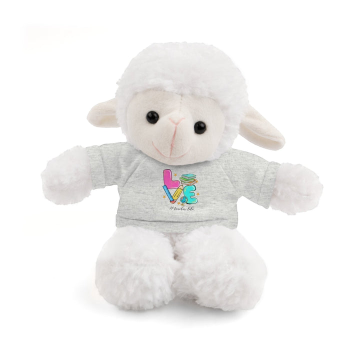 Sea Dragon Dreams white plush sheep stuffed animal wearing a grey t-shirt with Love Teacher Life graphic print
