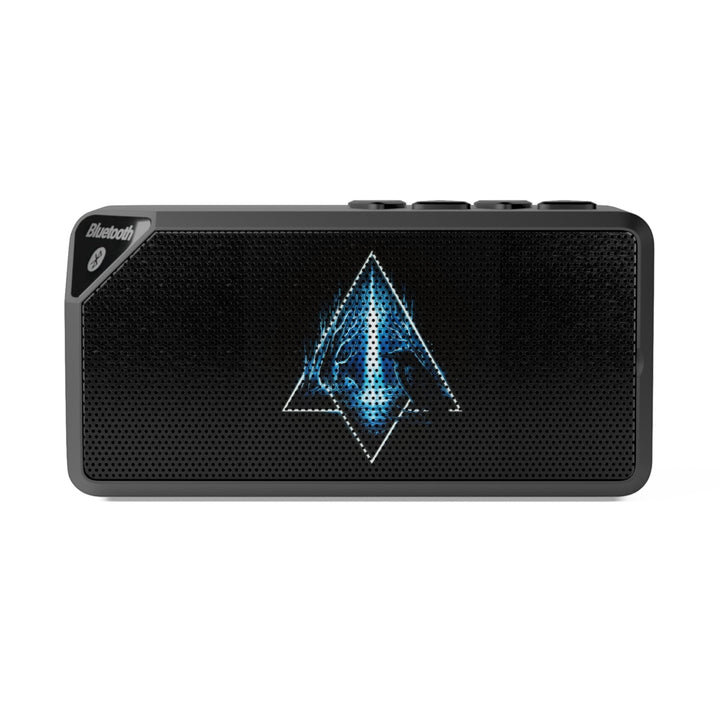 Sea Dragon Dreams portable Bluetooth speaker with a matte black ABS shell and an illuminated geometric emblem.