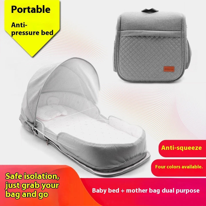 Sea Dragon Dreams portable grey baby lounger and diaper bag with canopy for supervised newborn rest