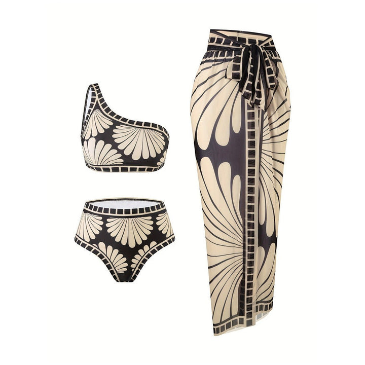 Sea Dragon Dreams 3-piece bikini set with one-shoulder top, high-waisted bottoms, and matching skirt in black and cream.