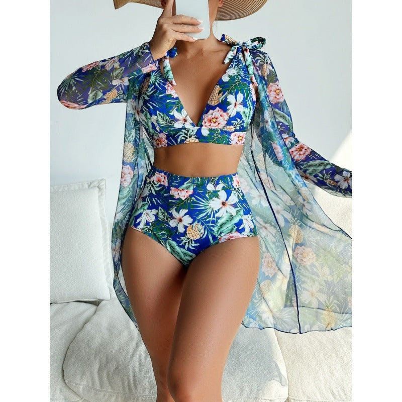 Sea Dragon Dreams 3-piece bikini set with blue tropical floral print, long-sleeve sheer cover-up, and high-waist bottoms