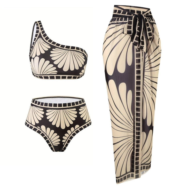 Sea Dragon Dreams 3-piece bikini set with one-shoulder top, high-waisted bottoms, and matching skirt in black and cream