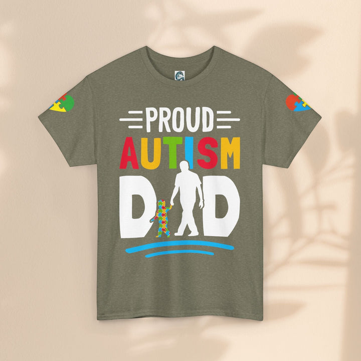 Sea Dragon Dreams olive green heavy cotton t-shirt with a colorful Proud Autism Dad graphic and puzzle piece design.