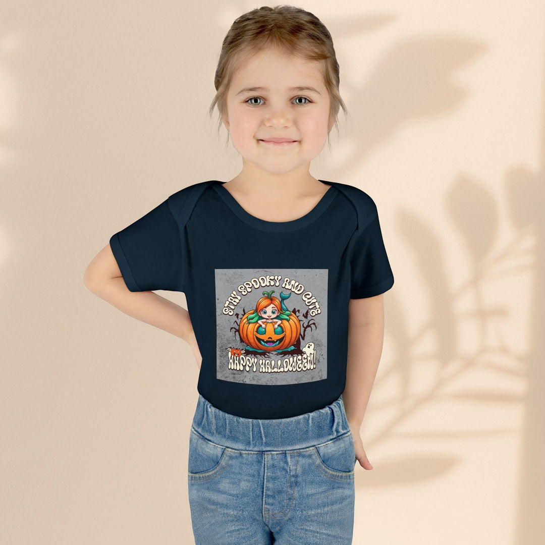 Sea Dragon Dreams infant bodysuit in dark navy with a Stay Spooky and Cute pumpkin Halloween graphic on a child
