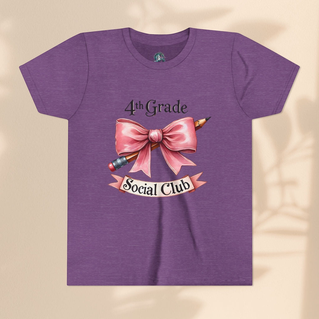 Sea Dragon Dreams purple youth short sleeve cotton tee featuring a 4th Grade Social Club graphic with a pink bow and pencil.