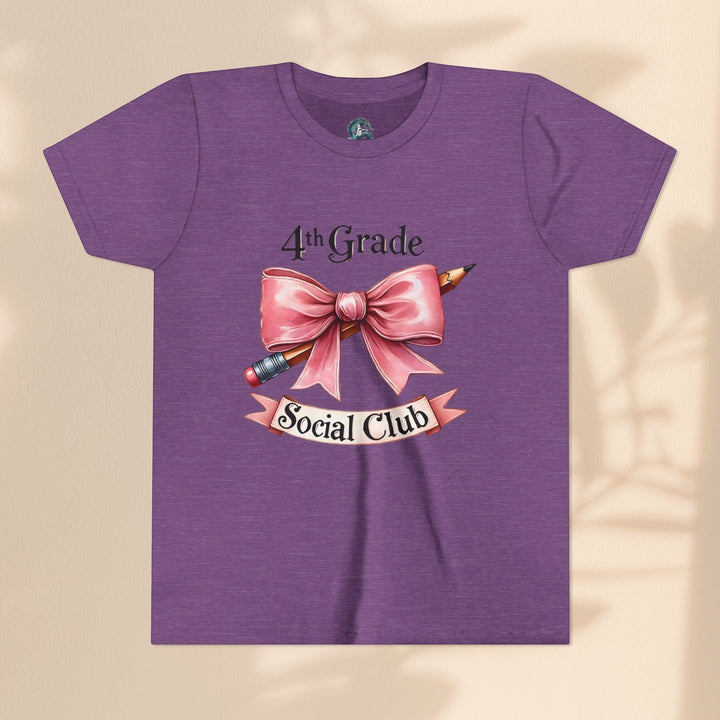 Sea Dragon Dreams purple youth short sleeve cotton tee featuring a 4th Grade Social Club graphic with a pink bow and pencil.