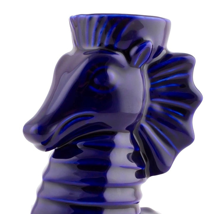 Sea Dragon Dreams ceramic dragon tiki mug in a vibrant purple glaze with intricate sculpted details.