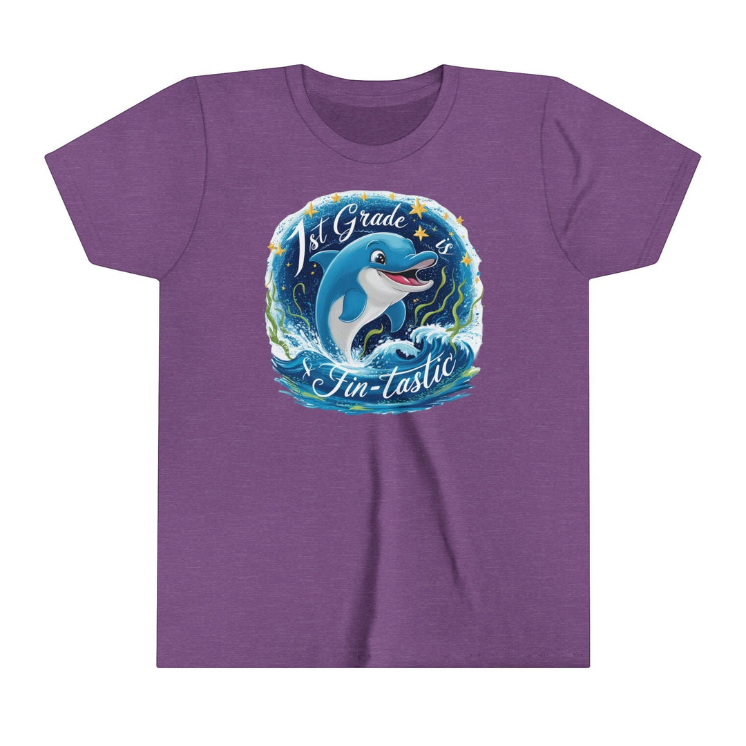 Sea Dragon Dreams purple youth t-shirt with a 1st Grade Fintastic dolphin graphic and crew neckline.