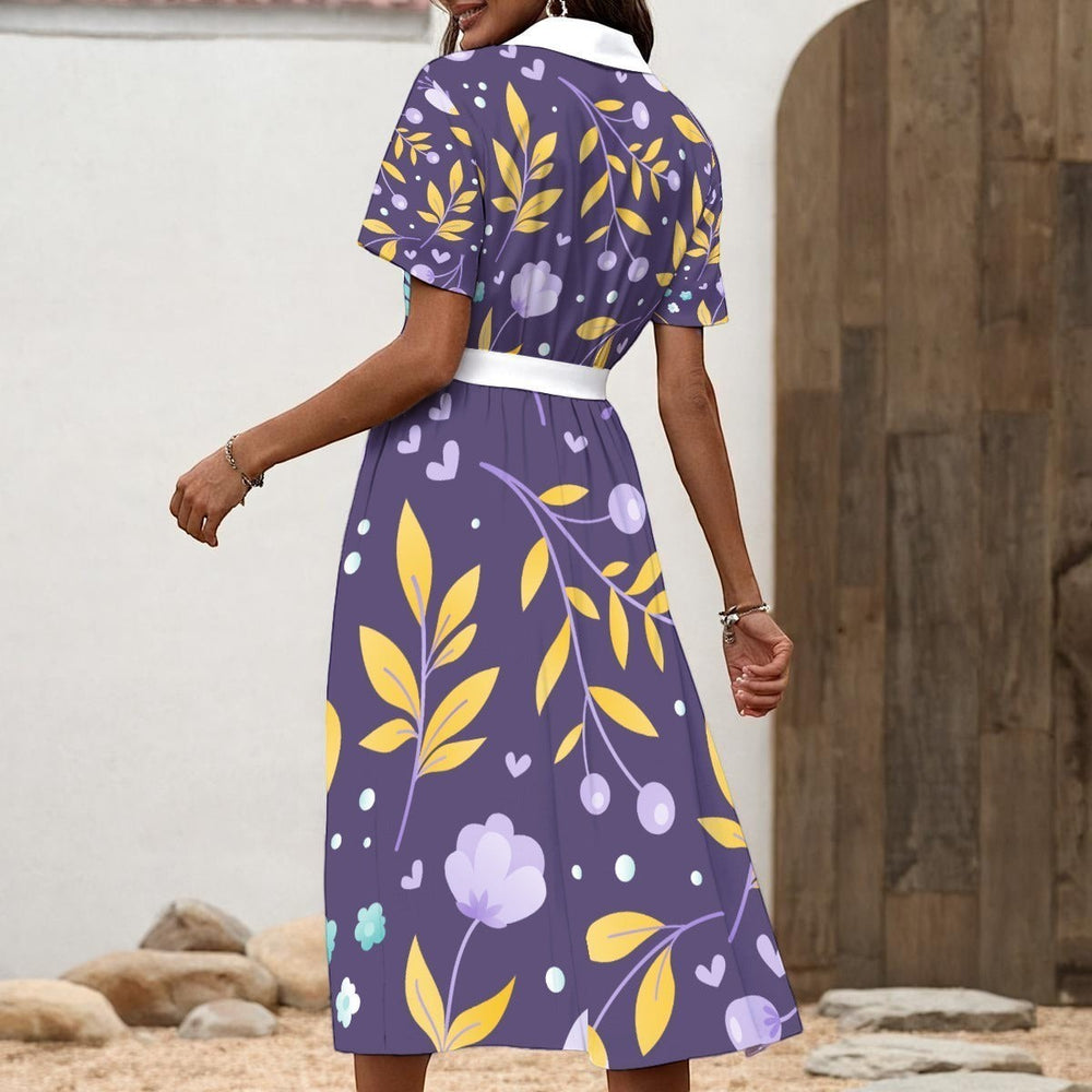 Sea Dragon Dreams purple shirt dress with yellow floral print, white collar, and waist tie, viewed from the back