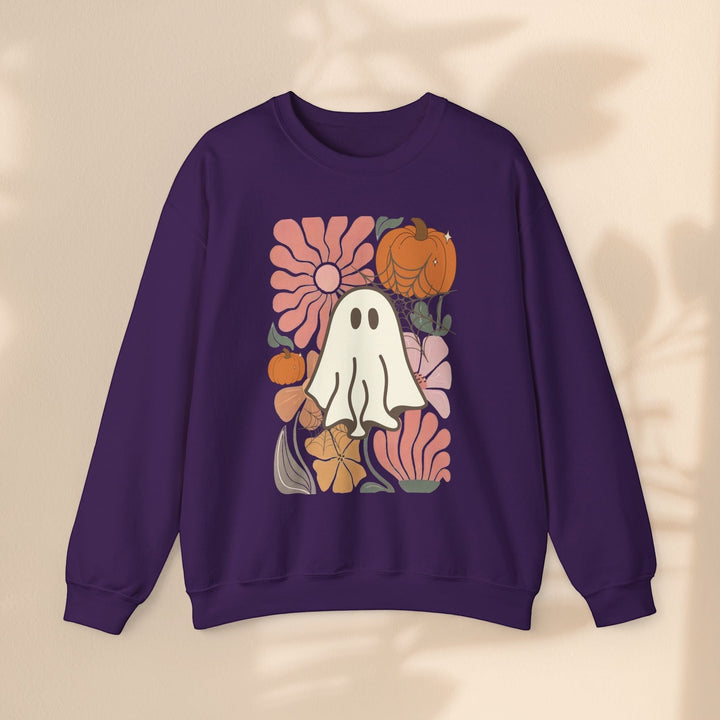 Sea Dragon Dreams purple crewneck sweatshirt featuring a retro ghost, pumpkin, and floral graphic print.