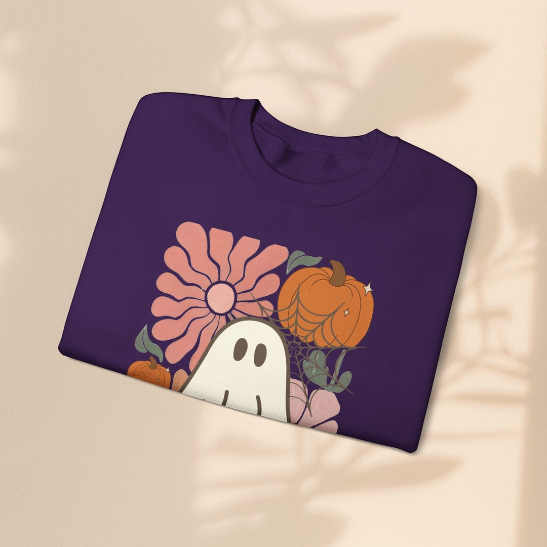 Sea Dragon Dreams purple crewneck sweatshirt with a retro ghost, pumpkin, and flower graphic print