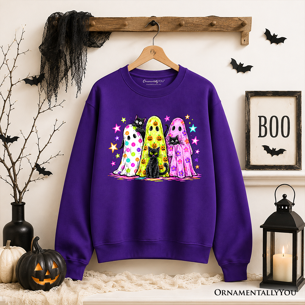 Sea Dragon Dreams purple sweatshirt featuring colorful neon ghosts and black cats, displayed on a wooden hanger.