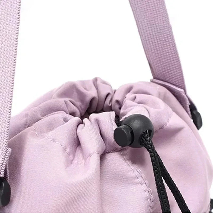 Sea Dragon Dreams light purple insulated water bottle carrier bag with drawstring closure and adjustable strap