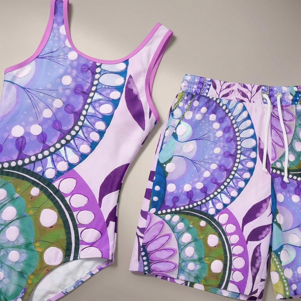 Sea Dragon Dreams purple patterned one-piece swimsuit and matching swim shorts with a vibrant abstract design.