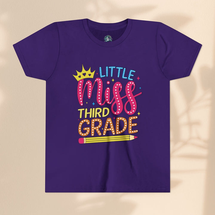 Sea Dragon Dreams purple youth t-shirt with Little Miss Third Grade graphic featuring a crown and pencil design.