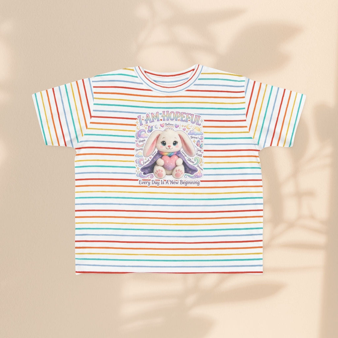 Sea Dragon Dreams toddler tee with rainbow stripes and a Hope Bunny graphic featuring the text I Am Hopeful.