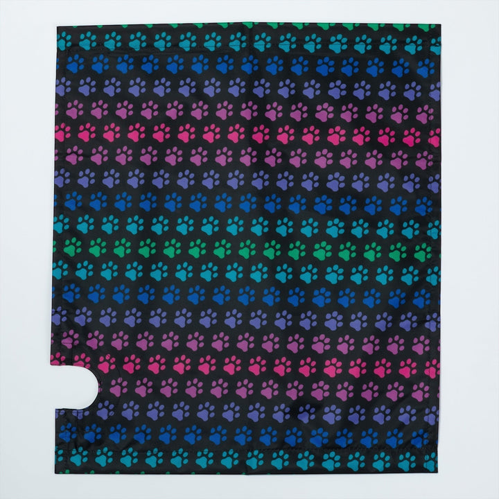 Sea Dragon Dreams magnetic mailbox cover featuring a vibrant rainbow paw print pattern on a black background.