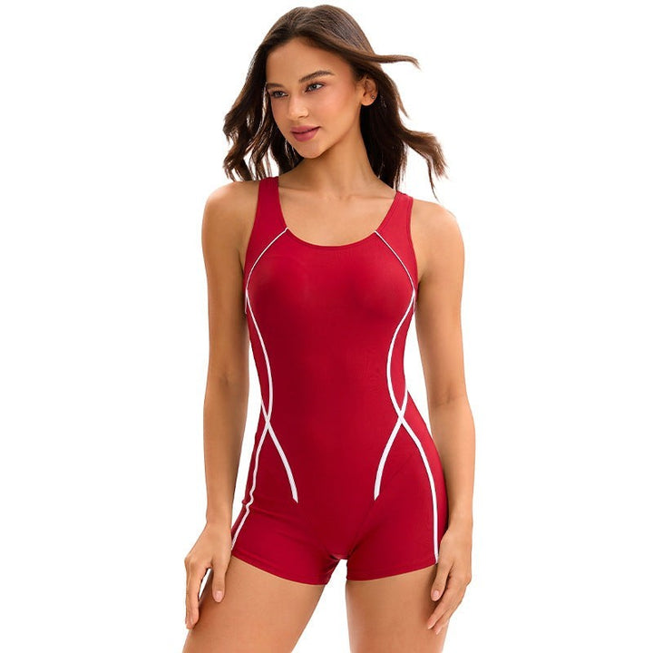 Sea Dragon Dreams red athletic one-piece swimsuit with white piping and boxer-style shorts on a model