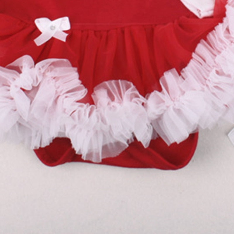Sea Dragon Dreams newborn Christmas romper in red with white tulle ruffles and a small bow detail