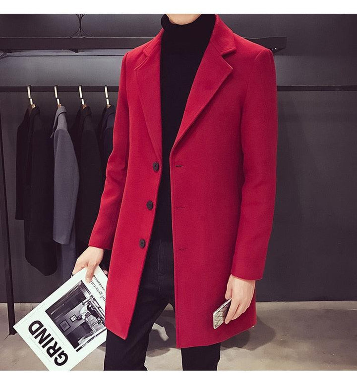Sea Dragon Dreams men's red cotton trench coat with a turn-down collar, worn over a black sweater for a business look.