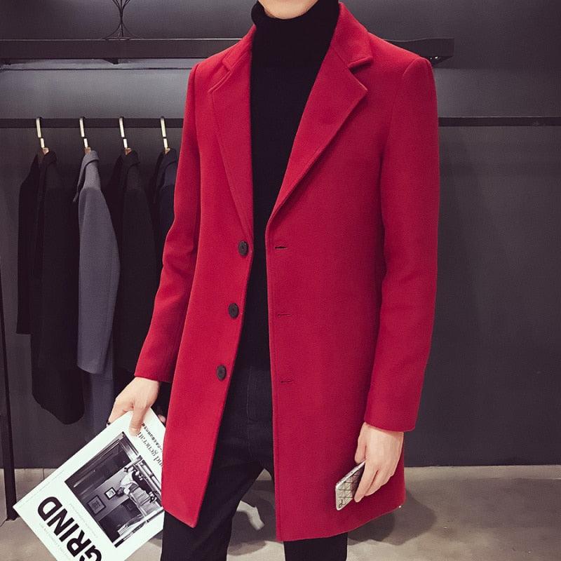 Sea Dragon Dreams men's red cotton trench coat with a turn-down collar, worn over a black turtleneck for a smart look.